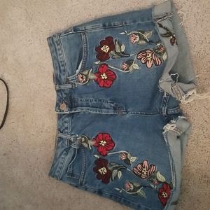 Embroidered denim cutoff shorts